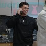 Christian’s black sweatshirt on Next Gen NYC