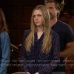 Claire's navy polka dot romper on The Young and the Restless