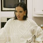 Danielle’s white fringed cable knit sweater on In The City