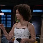 Deanna’s white polka dot top on Beyond the Gates