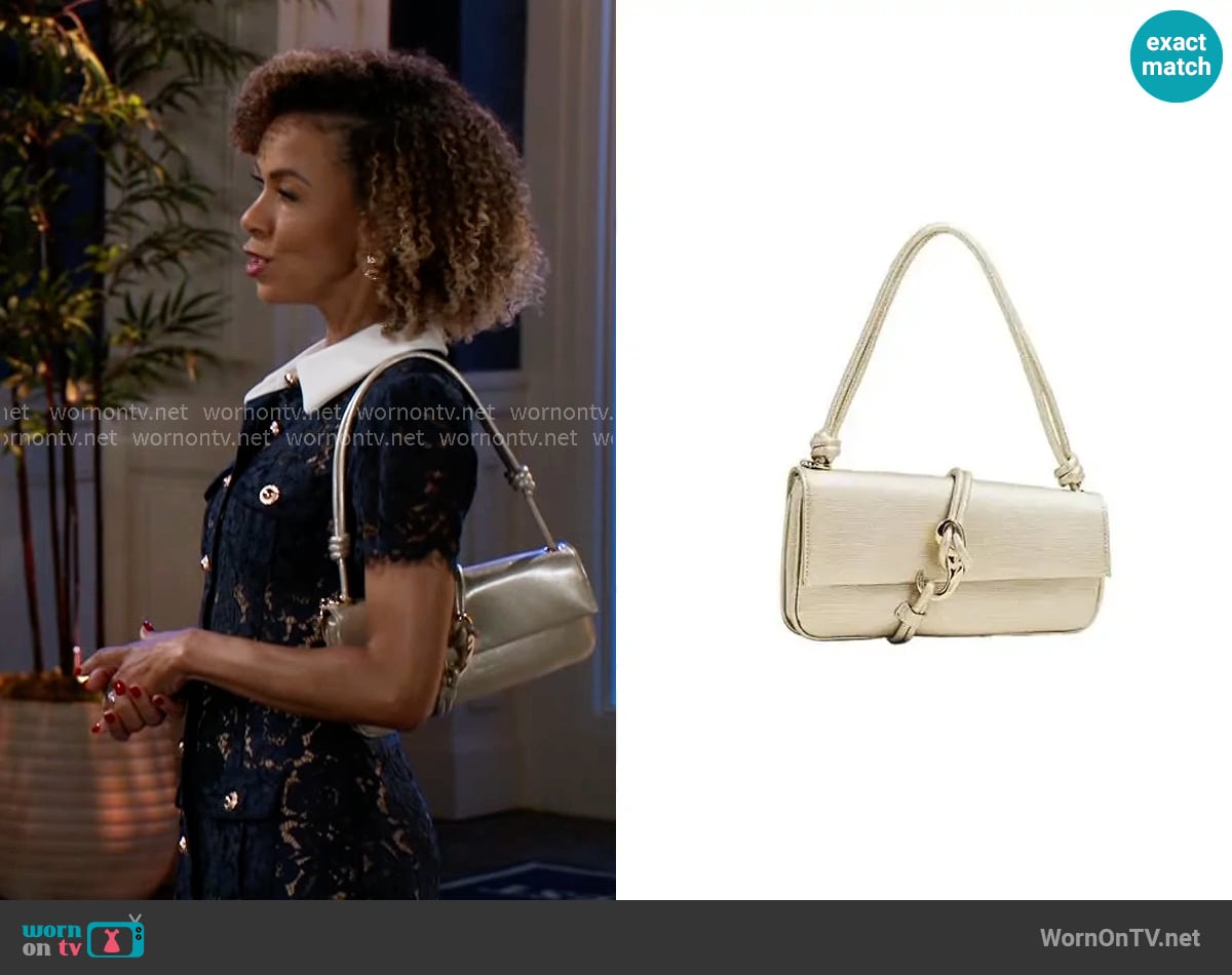 Dolce Vita Alice Bag worn by Anastasia Belleclaire (Timeca Seretti) on Beyond the Gates