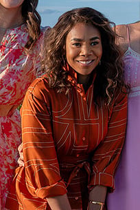 Dru-Ann’s orange geometric print shirt and pants set on The Five Star Weekend