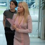 Elle’s pink asymmetric button mini dress on Elle
