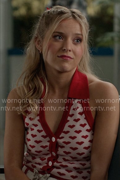 Elle’s pink heart knit top on Elle