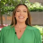 Emily’s green pleated tie neck dress on Access Hollywood
