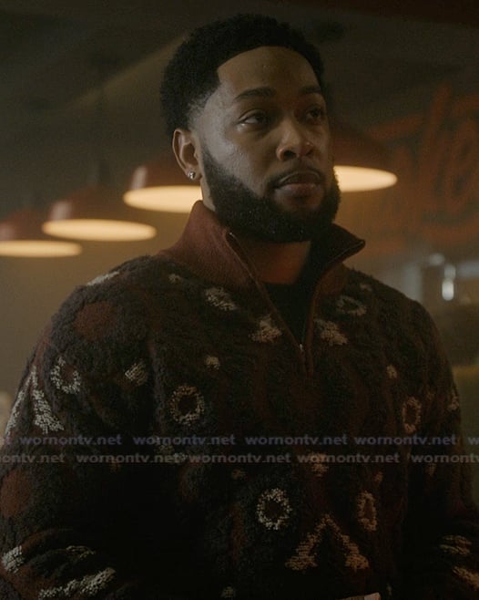 Emmett’s red textured quarter zip sweater on The Chi