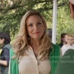 Eva's beige print blouse and green belt on Elle