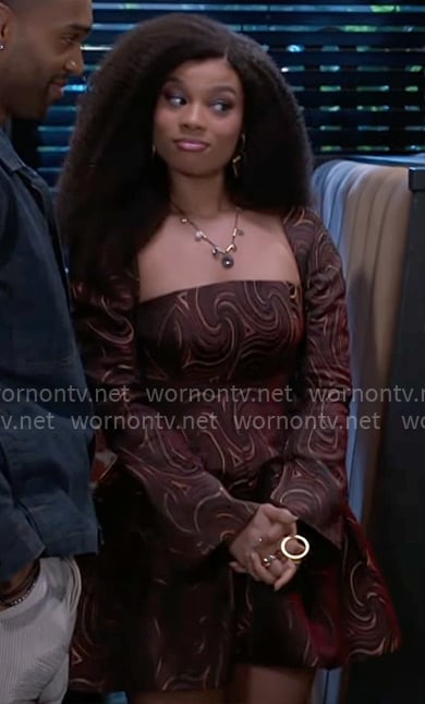 Eva’s brown swirl print dress on Beyond the Gates