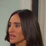 Gabi’s black ribbed dress with gold buttons on Days of our Lives