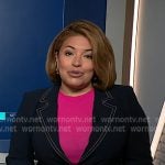 Gilma's navy stitching blazer and print pleated skirt on NBC News Daily