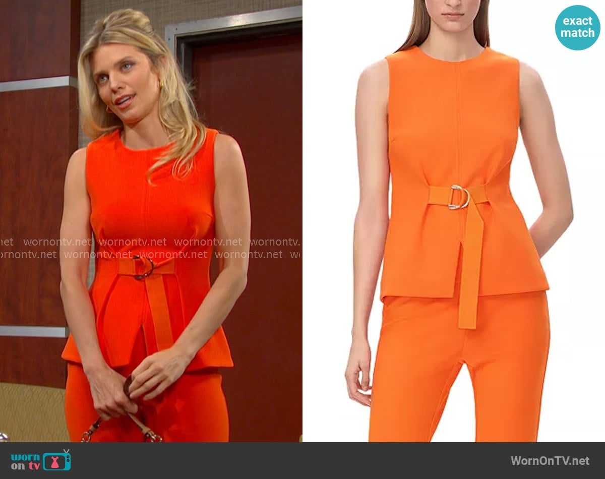 Cat’s orange belted peplum top on Days of our Lives
