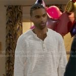Izaiah’s cream textured sweater and printed pants on Beyond the Gates