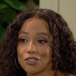 Jada's black scoop neck henley top on Days of our Lives