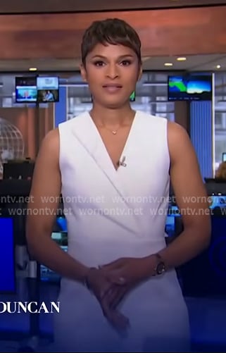 Jericka’s white sleeveless surplice dress on CBS Evening News