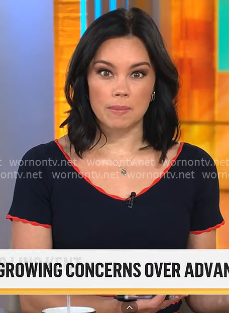 Jo Ling Kent’s navy dress with red trims on CBS Mornings Jo Ling Kent’s navy dress with red trims on CBS Mornings