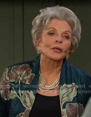 Julie’s green floral print open jacket on Days of our Lives