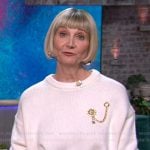 Kerri's white brooch detail sweater on The Kelly Clarkson Show