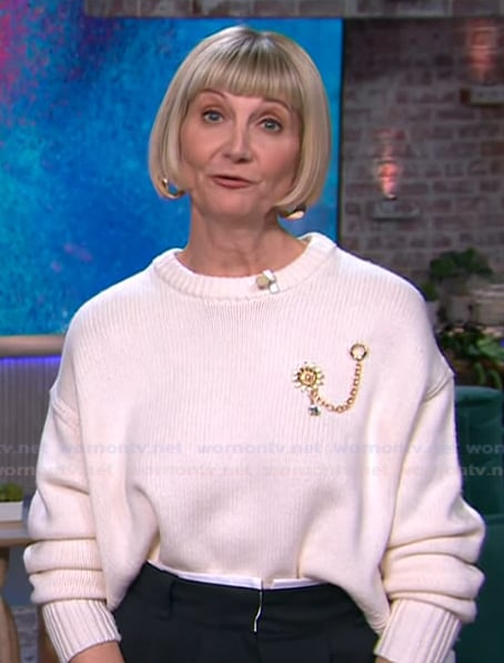 Kerri’s white brooch detail sweater on The Kelly Clarkson Show