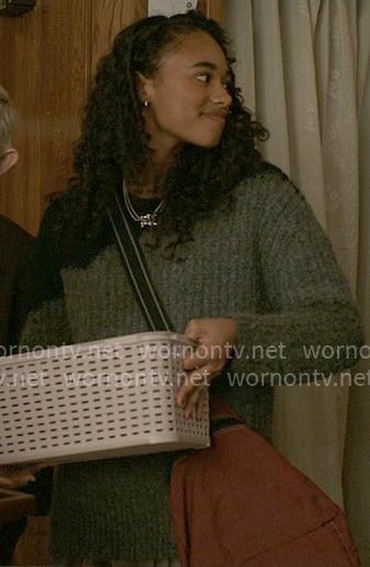 Kimberly’s colorblock sweater and silver necklaces on Elle
