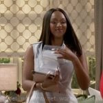 Laura’s grey dress and brown bag on Beyond the Gates