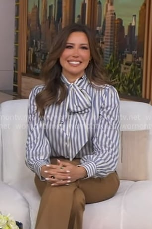 Leslie Lopez’s blue striped tie neck blouse on Good Morning America