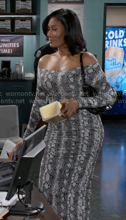 Leslie’s snake print off-shoulder dress on Beyond the Gates