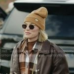 Lindsay’s brown plaid shirt and leather jacket on In The City