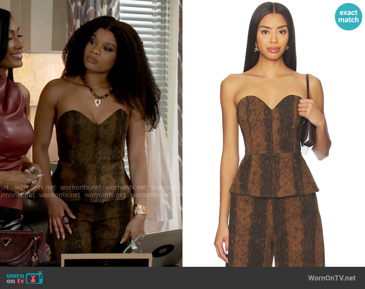 Line & Dot Iggy Peplum Top worn by Eva Thomas (Ambyr Michelle) on Beyond the Gates