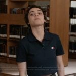 Liz’s navy polo on Elle