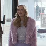 Madison's purple fringed jacket, floral top, and shorts with phone bag on Elle