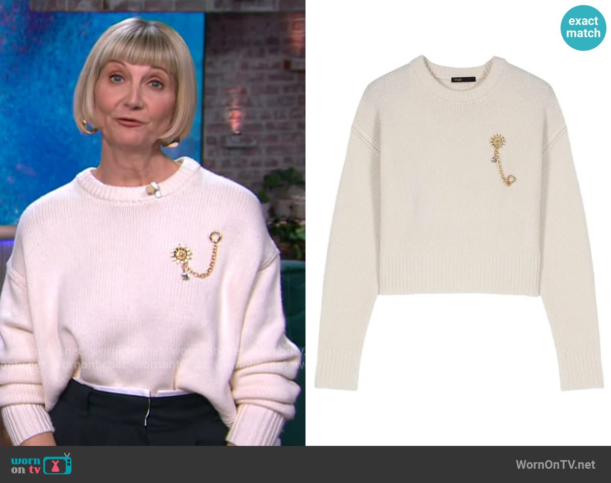 Maje Sweater with floral brooch worn by Kerri Kenney-Silver on The Kelly Clarkson Show