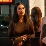 Michelle’s brown mesh top and leather skirt on The Valley