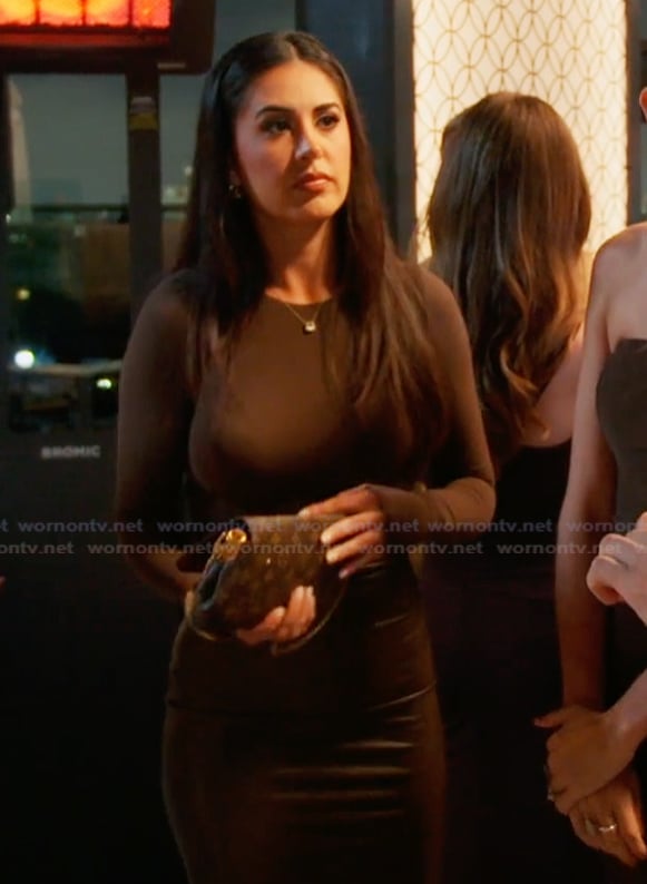 Michelle’s brown mesh top and leather skirt on The Valley