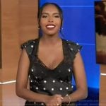 Mona’s black polka dot print dress on Extra