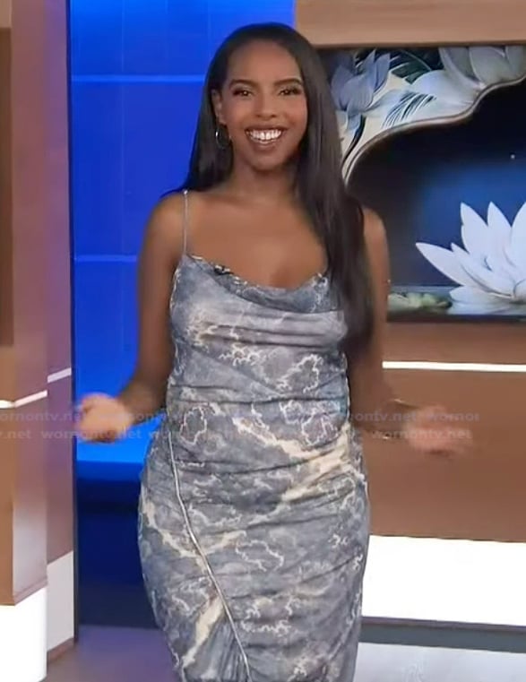 Mona’s blue printed cowl neck dress on Extra