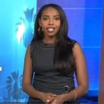 Mona’s denim belted dress on Extra