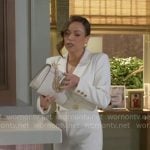 Nicole’s white jumpsuit with cutout back on Beyond the Gates