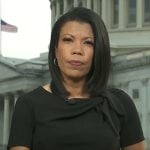Nikole Killion's black tie neck jumpsuit on CBS Evening News