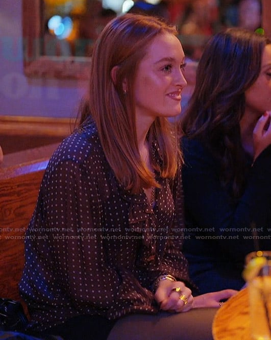 Rowan’s black polka dot print blouse on Next Gen NYC