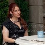 Sally's black buckled midi dress and knotted earrings on The Young and the Restless