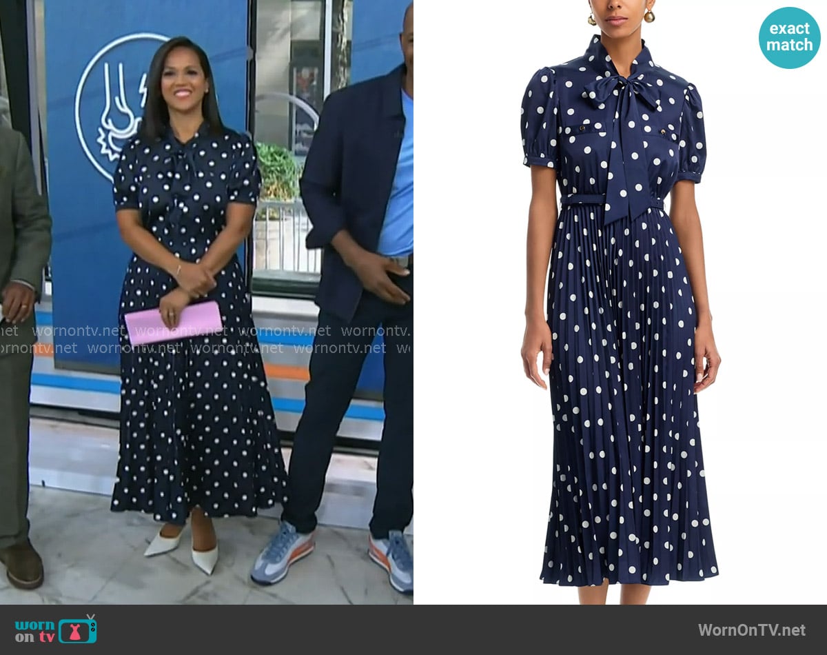 Laura’s navy polka dot tie neck dress on Today
