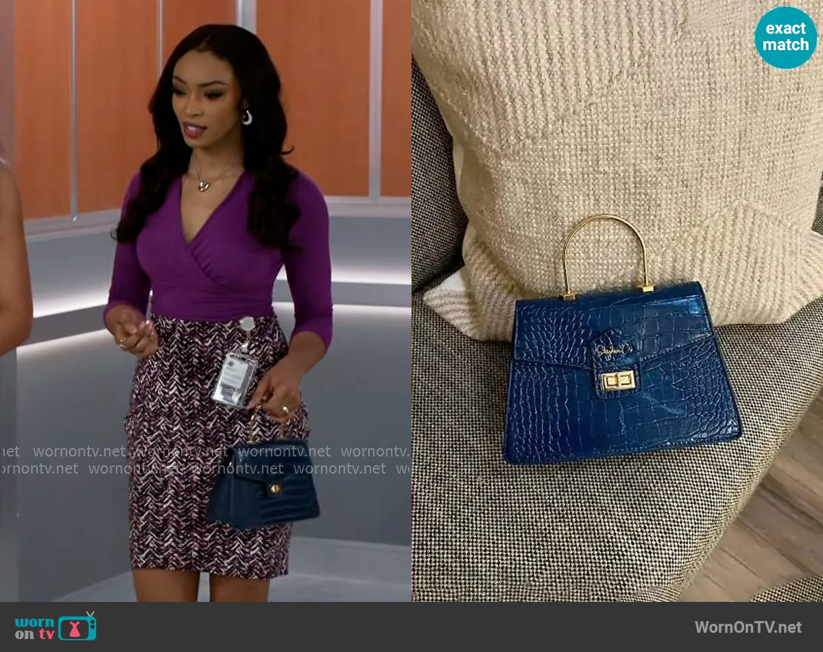 Shydiva Tracee Bag worn by Madison Montgomery (Kenjah) on Beyond the Gates