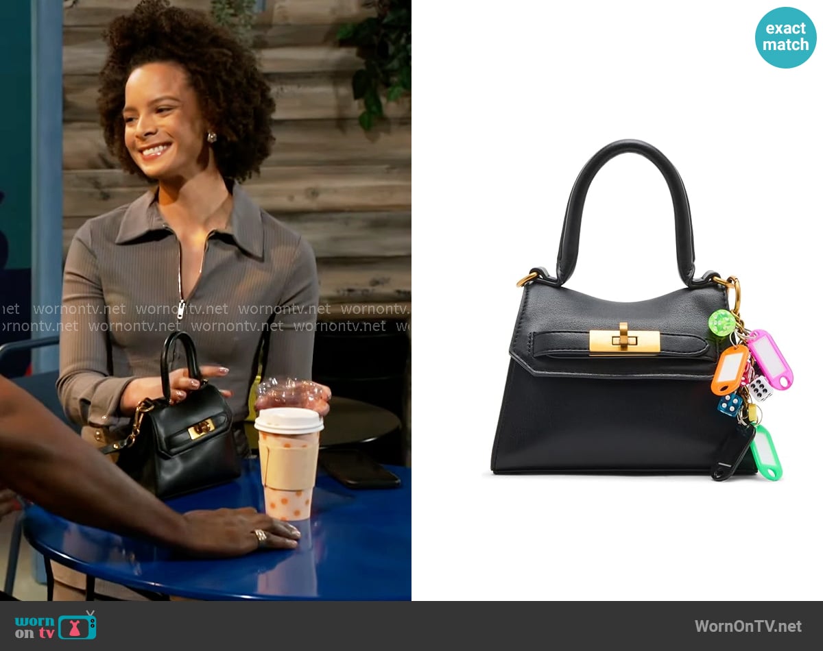 Steve Madden Deedee Mini Top Handle worn by Deanna McBride (Angela Fairley) on Beyond the Gates