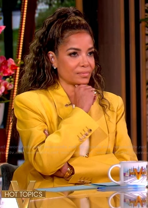Sunny’s yellow blazer and white button front top on The View