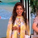 Sunny’s yellow floral tie dye blouse on The View