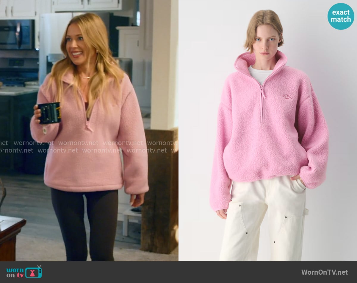 Tna Zephyr Mockneck Half-zip Sweatshirt in morganite pink worn by Masha Petrova on The McBee Dynasty Real American Cowboys
