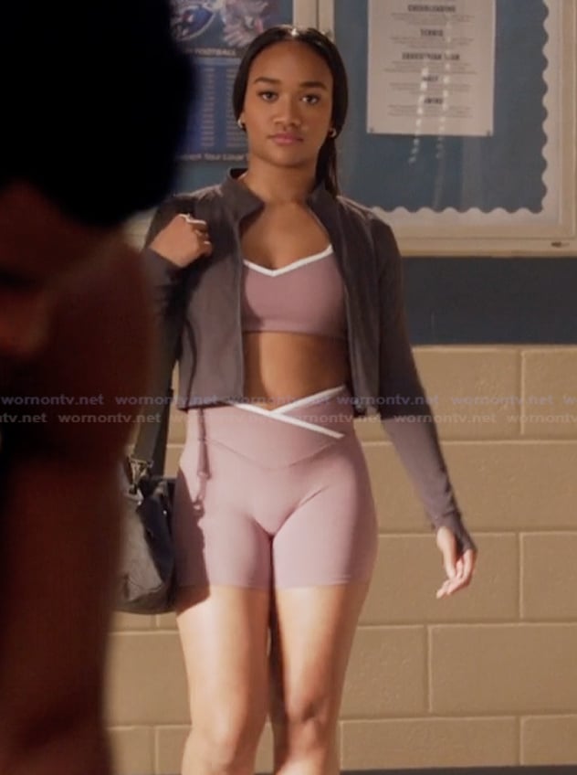 Tori’s purple sports bra and biker shorts on All American