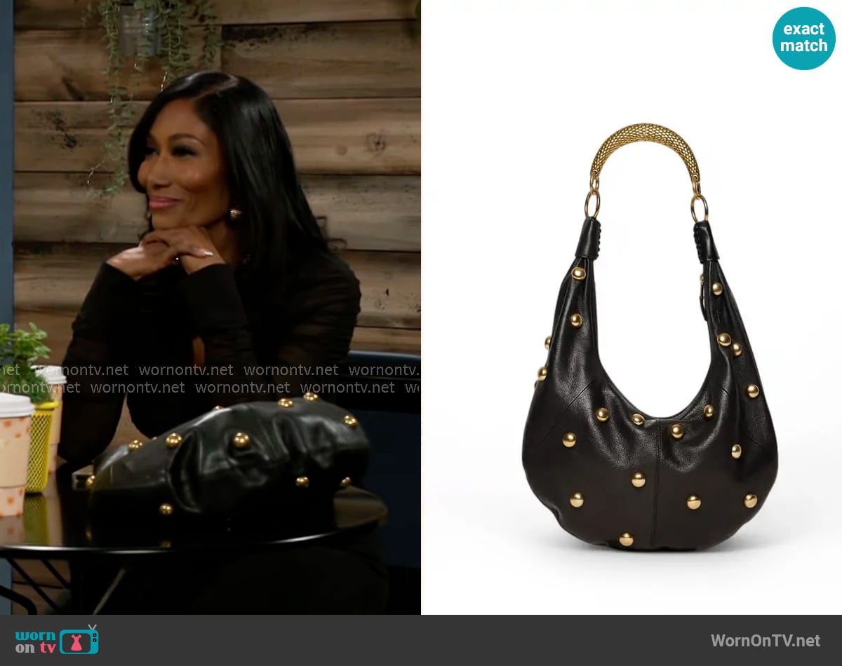 Leslie’s black studded bag on Beyond the Gates Leslie’s black studded bag on Beyond the Gates