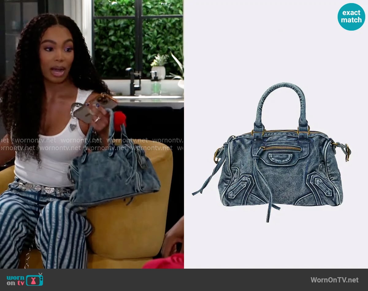 Akira I'm That Girl Distressed Purse worn by Chelsea Hamilton (RhonniRose Mantilla) on Beyond the Gates Akira I'm That Girl Distressed Purse worn by Chelsea Hamilton (RhonniRose Mantilla) on Beyond the Gates
