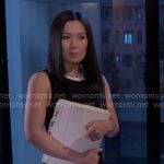 Caroline’s black dress with white trims on Beyond the Gates
